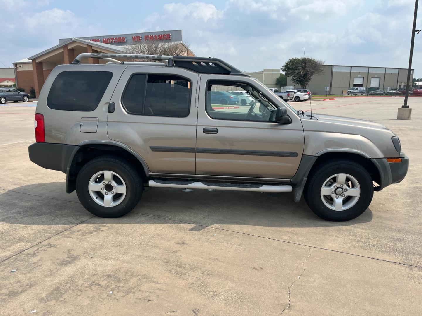 2004 GOLD /gray Nissan Xterra (5N1ED28T84C) , Automatic transmission, located at 14700 Tomball Parkway 249, Houston, TX, 77086, (281) 444-2200, 29.928619, -95.504074 - Photo#7